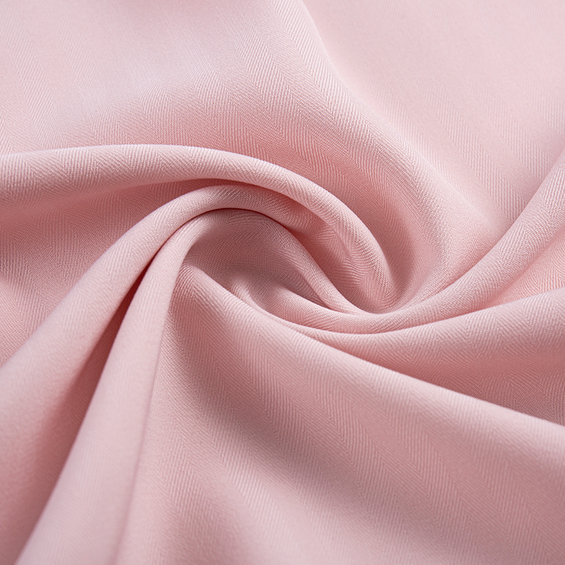 Tessuto twill elasticizzato a spina di pesce con trama