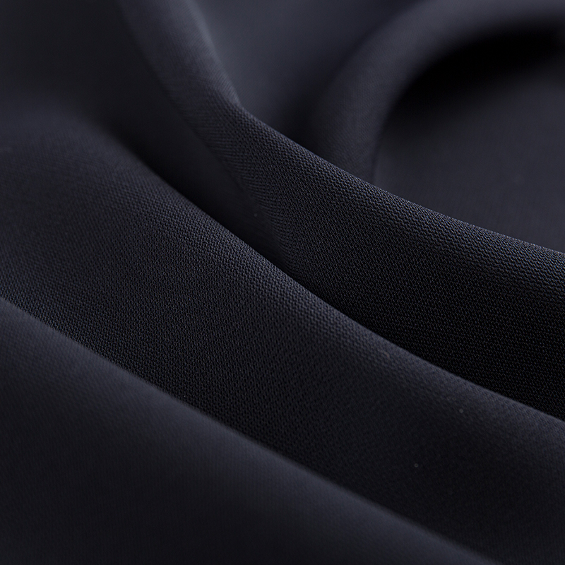 Tessuto elastico a doppio strato con filamento composito