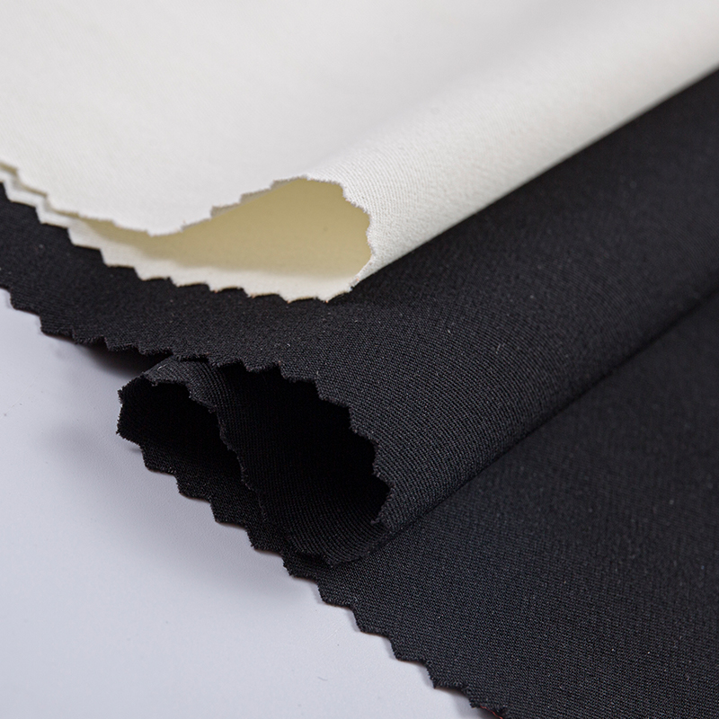 Tessuto elastico simile al cotone a filamento composito