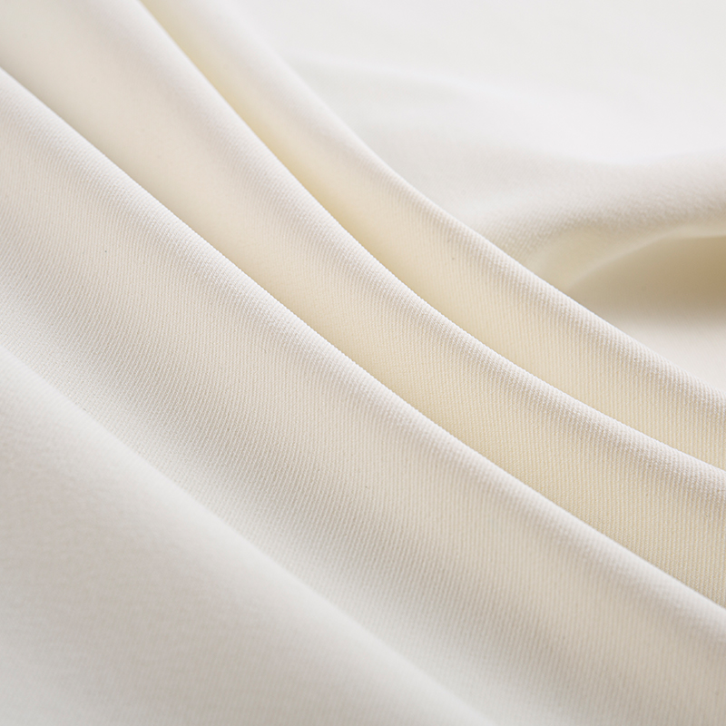 Tessuto elastico simile al cotone a filamento composito