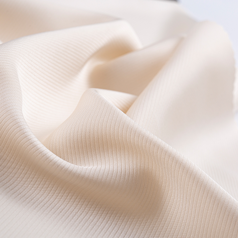 Tessuto in twill cationico imitazione acetato