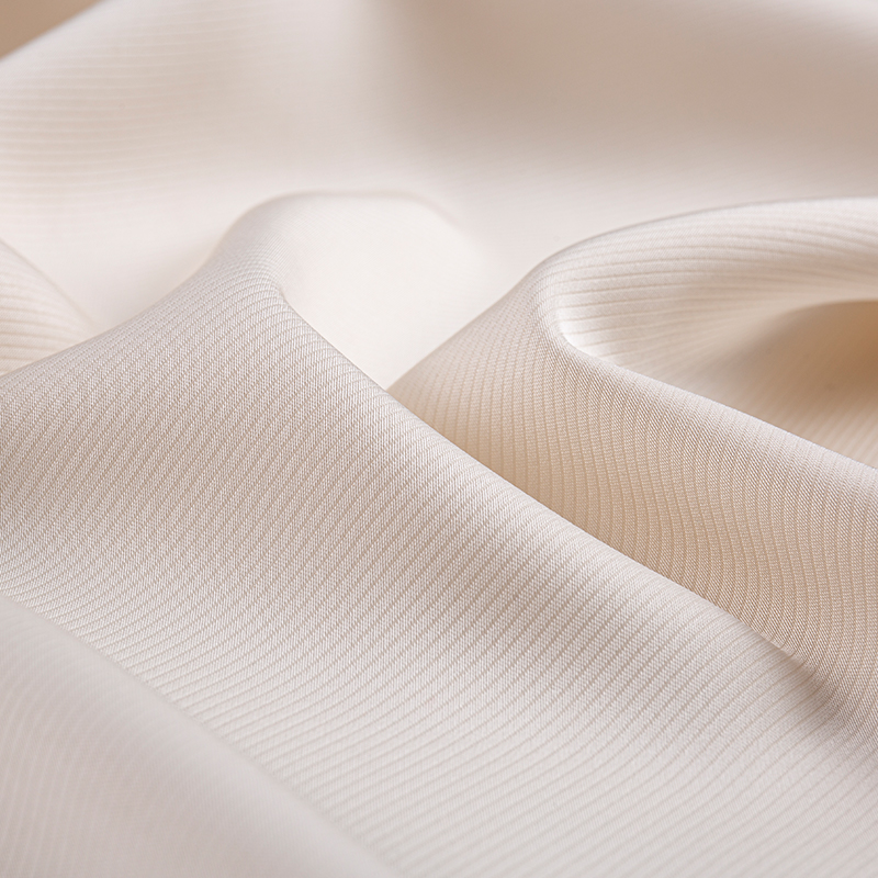 Tessuto in twill cationico imitazione acetato